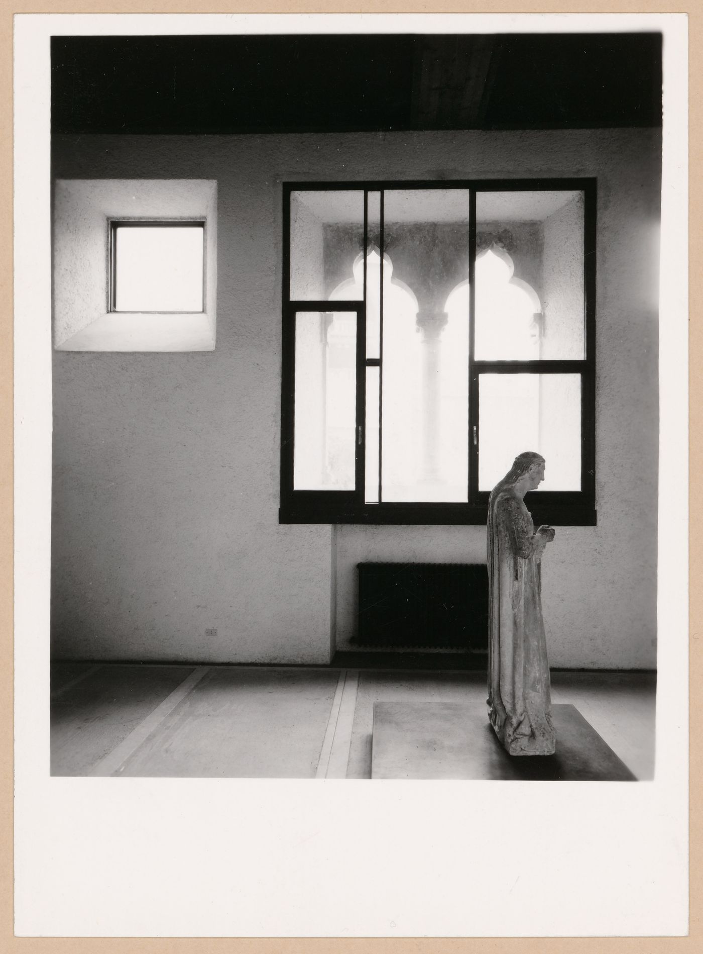 Interior view of a gallery showing a statue and windows, Museo di Castelvecchio, Verona, Italy