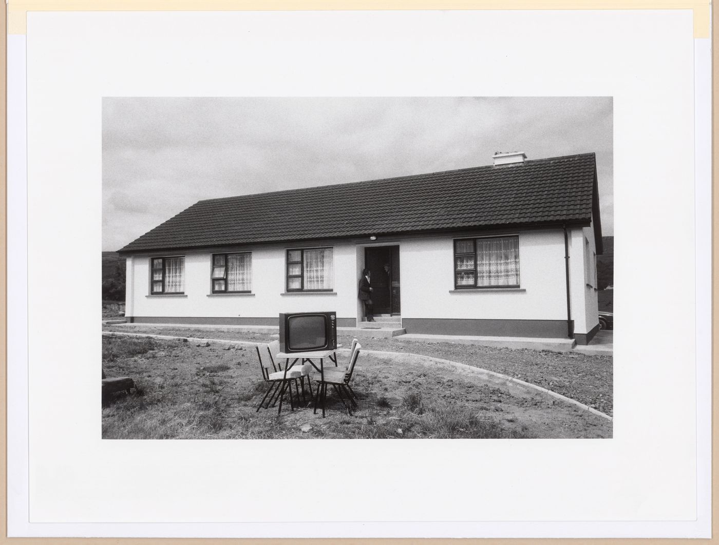 Bungalow and TV set on chairs in front, Keadue, County Roscommon, Ireland
