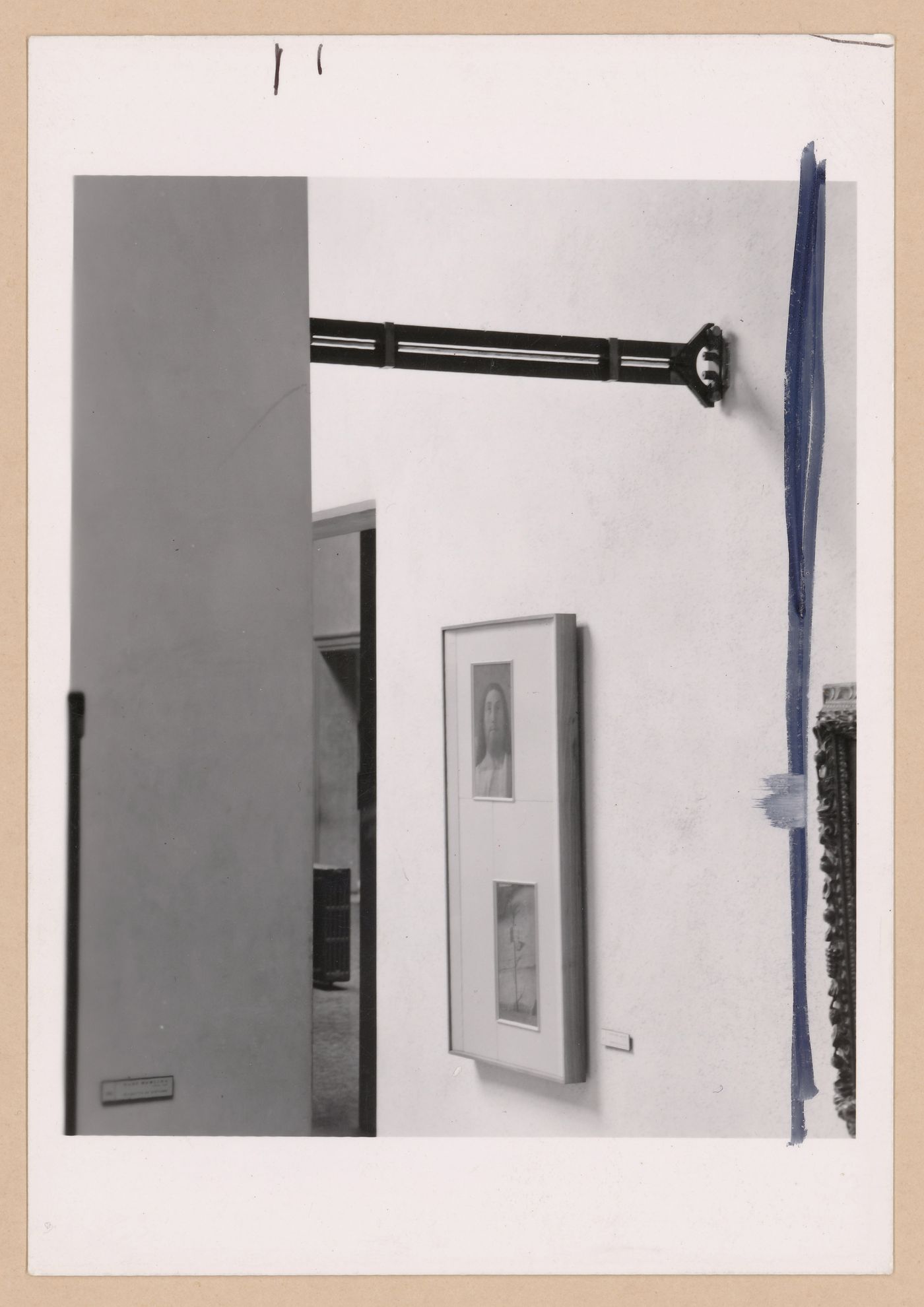 Close-up view of a partition support bar with paintings in the background, Gallerie dell'Accademia di Venezia, Venice, Italy