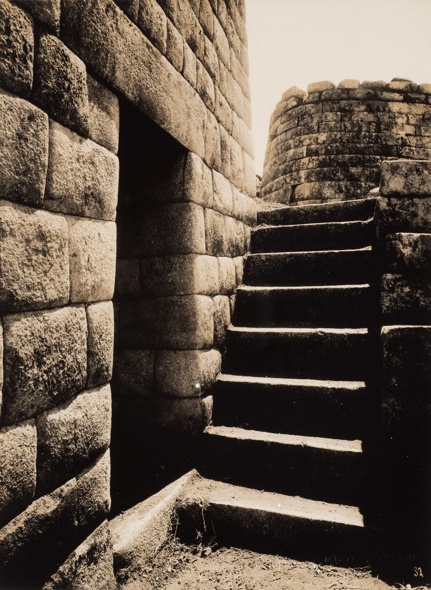 View of the entrance to the House of Ñusta and the staircase leading to the Torreón, Machu Picchu, Peru