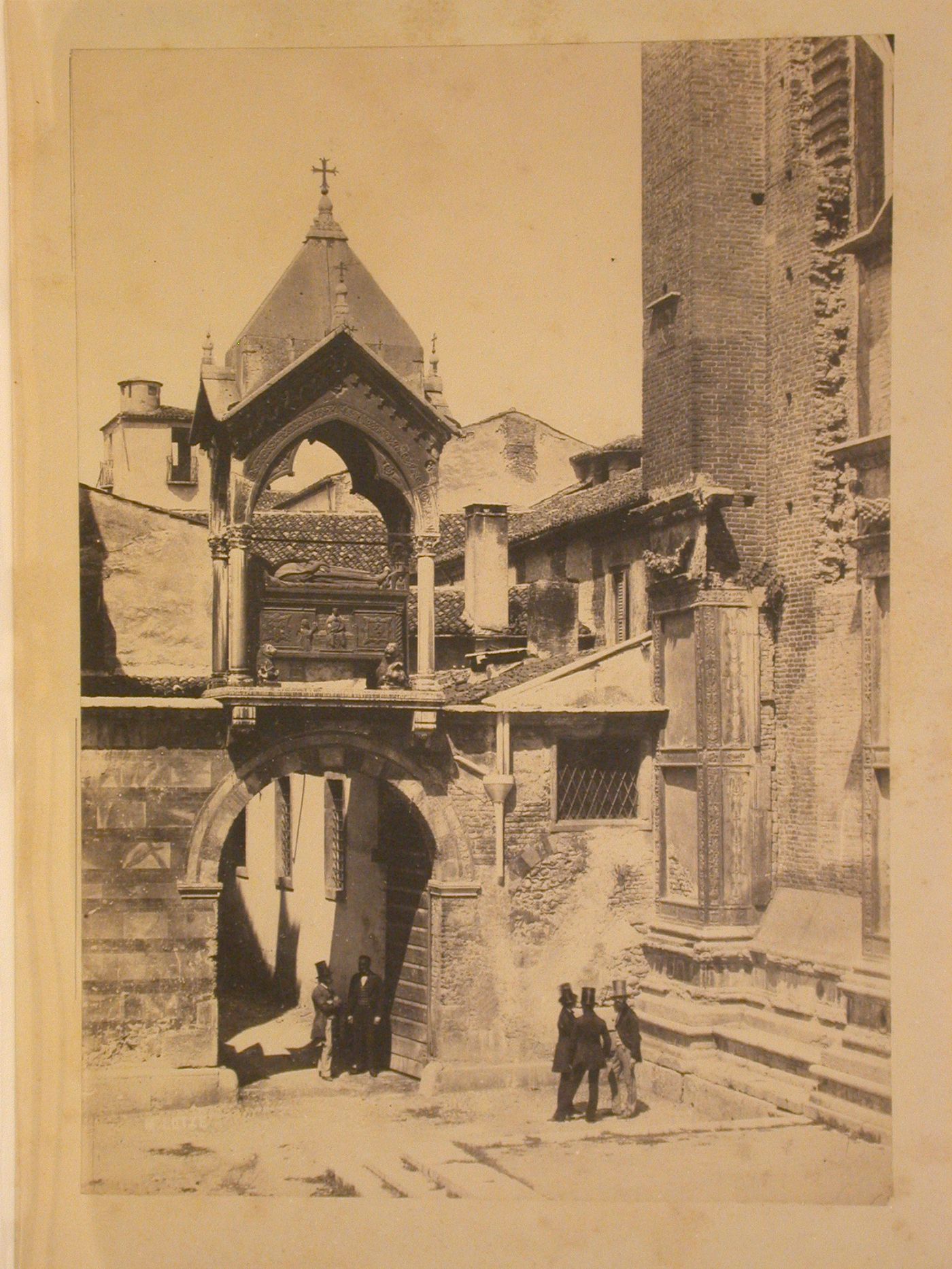 View the elevated tomb of Count Guglielmo di Castelbarco above the cemetery gate of the Church of Sant'Anastasia, Verona, Italy