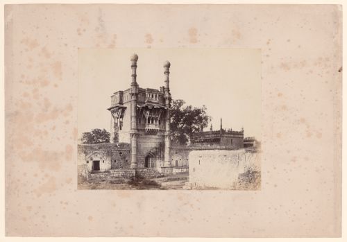 View of the gatehouse of the Mehtar Mahal [Sweeper's Palace] with a mosque on the right, Beejapore (now Bijapur), India