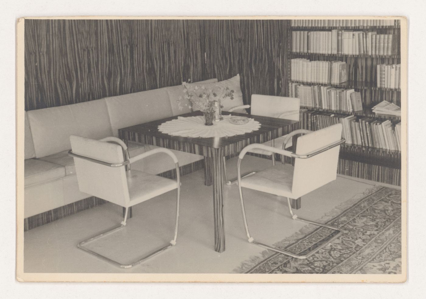 Interior view of a corner of the library showing a seating area, Tugendhat House, Brno, Czechoslovakia (now Czech Republic)