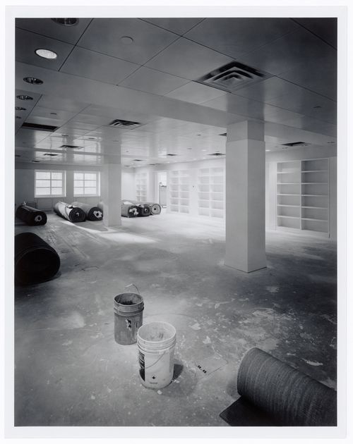 Interior view of the curatorial level showing rolls of carpet prior to installation, Canadian Centre for Architecture under construction, Montréal, Québec