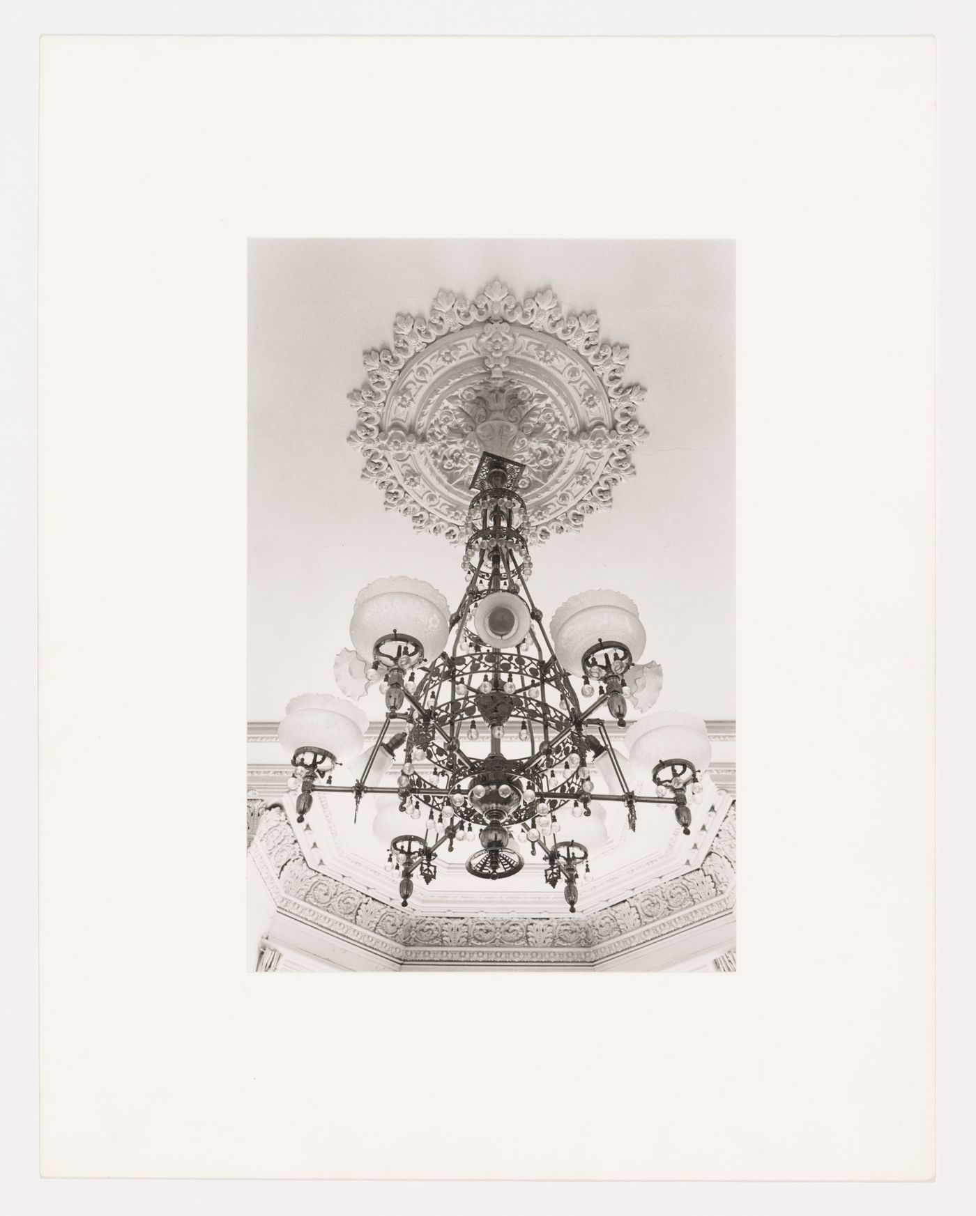 Interior view of a converted gas chandelier in the west part of Shaughnessy House, Montréal, Québec, Canada