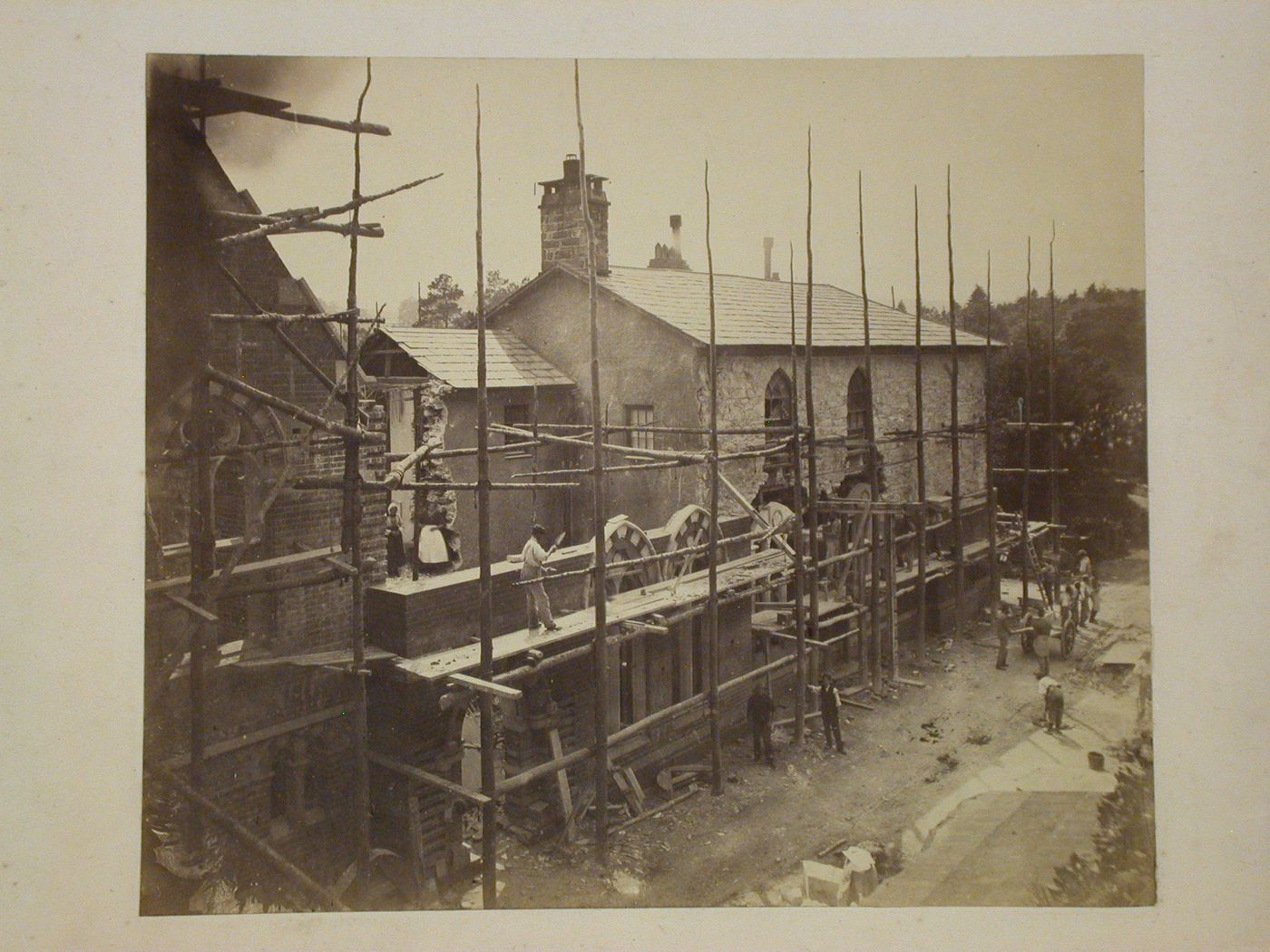Partial view of the north façade of Voelas Hall under construction showing a portion of the former manor house "Lima" prior to being enclosed into the new hall, Pentrefoelas, Denbighshire, Wales