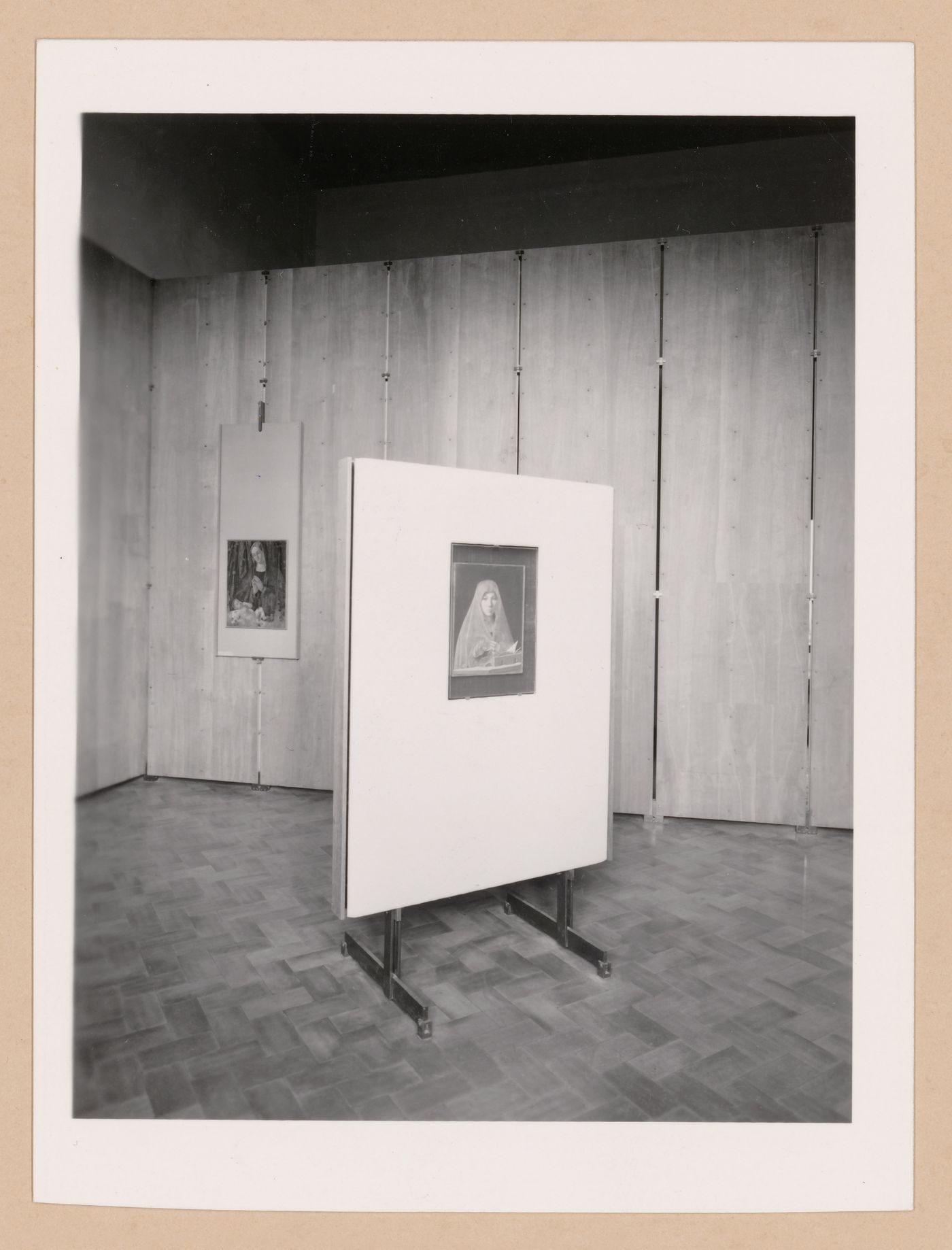 Interior view of the Salle di Antonia Messina showing a paintings including one mounted in a freestanding frame, Palazzo Abatellis, Galleria regionale della Sicilia, Palermo, Italy