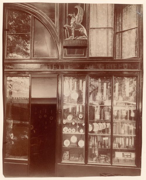 Detail of shop window with many clocks and thermometers, Paris, France