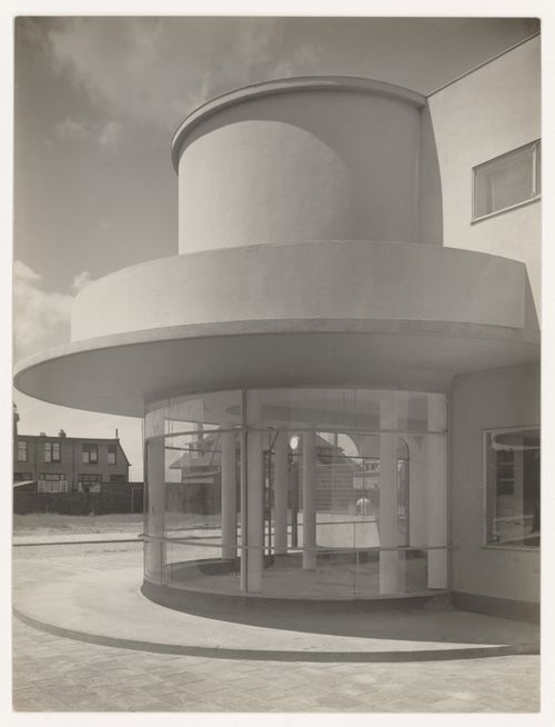Exterior view of industrial row houses showing a corner store, Hoek van Holland, Netherlands