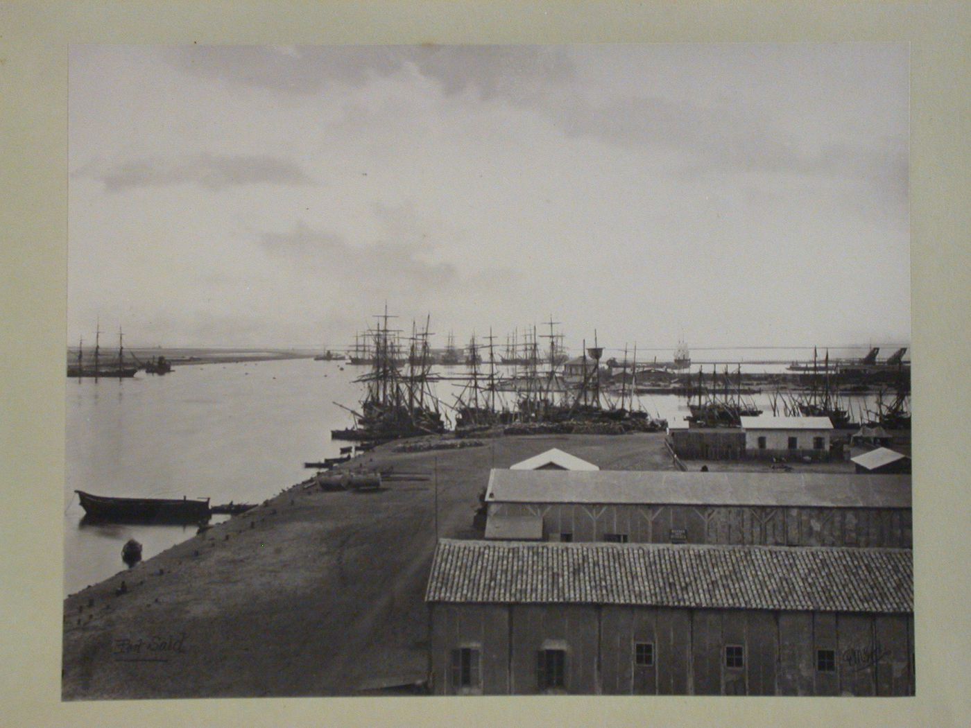 View from the quay of inner harbour, looking south, commercial basin in foreground, Port Said, Egypt