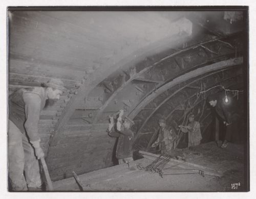 Construction of the Paris Metro, interior view of tunnel with workers, Paris, France