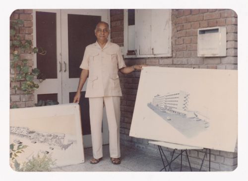 Aditya Prakash showing two drawings submitted by him as part of a 1986 housing project competition in Meerut, India
