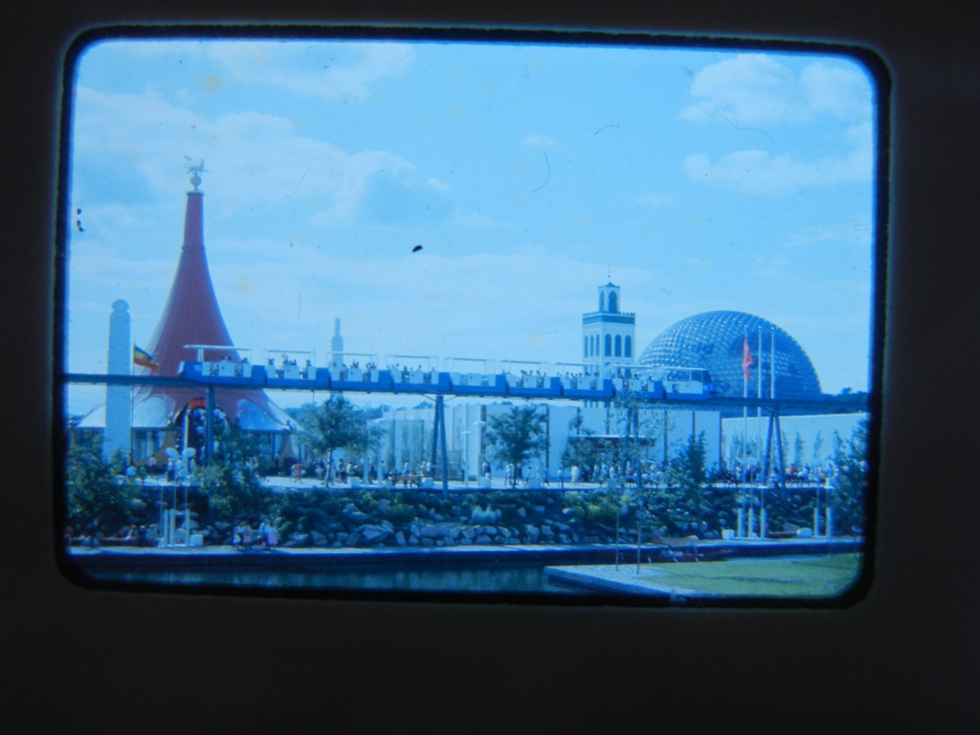 View of the Ethiopian and Tunisian Pavilions with a minirail in foreground, Expo 67, Montréal, Québec