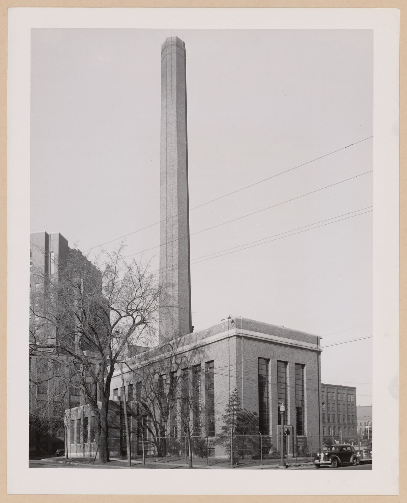 View of the principal and lateral façades of the addition to the Power House with the Manufacturing Building on the left, The Upjohn Company Assembly Plant, Kalamazoo, Michigan