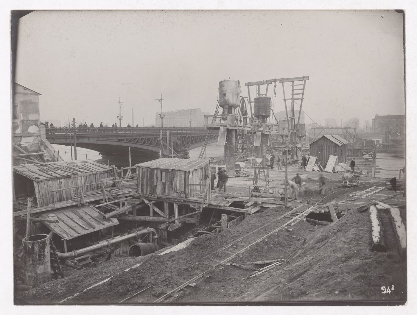 Construction of the Paris Metro, exterior view of a worksite with workers, Paris, France