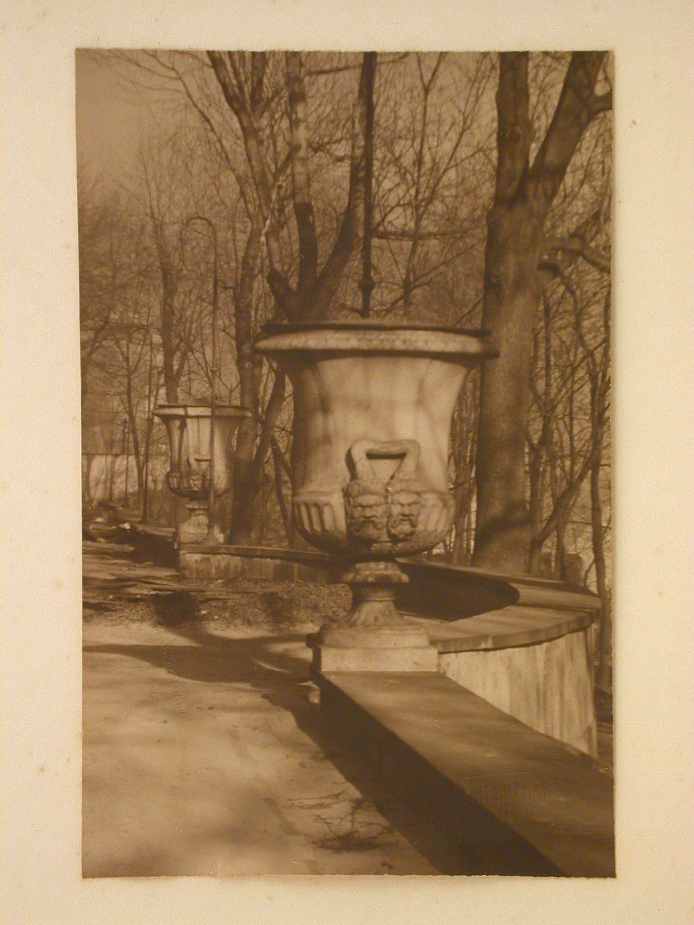 Ornamental urns in park setting, possibly Lazienki Park, Warsaw, Poland