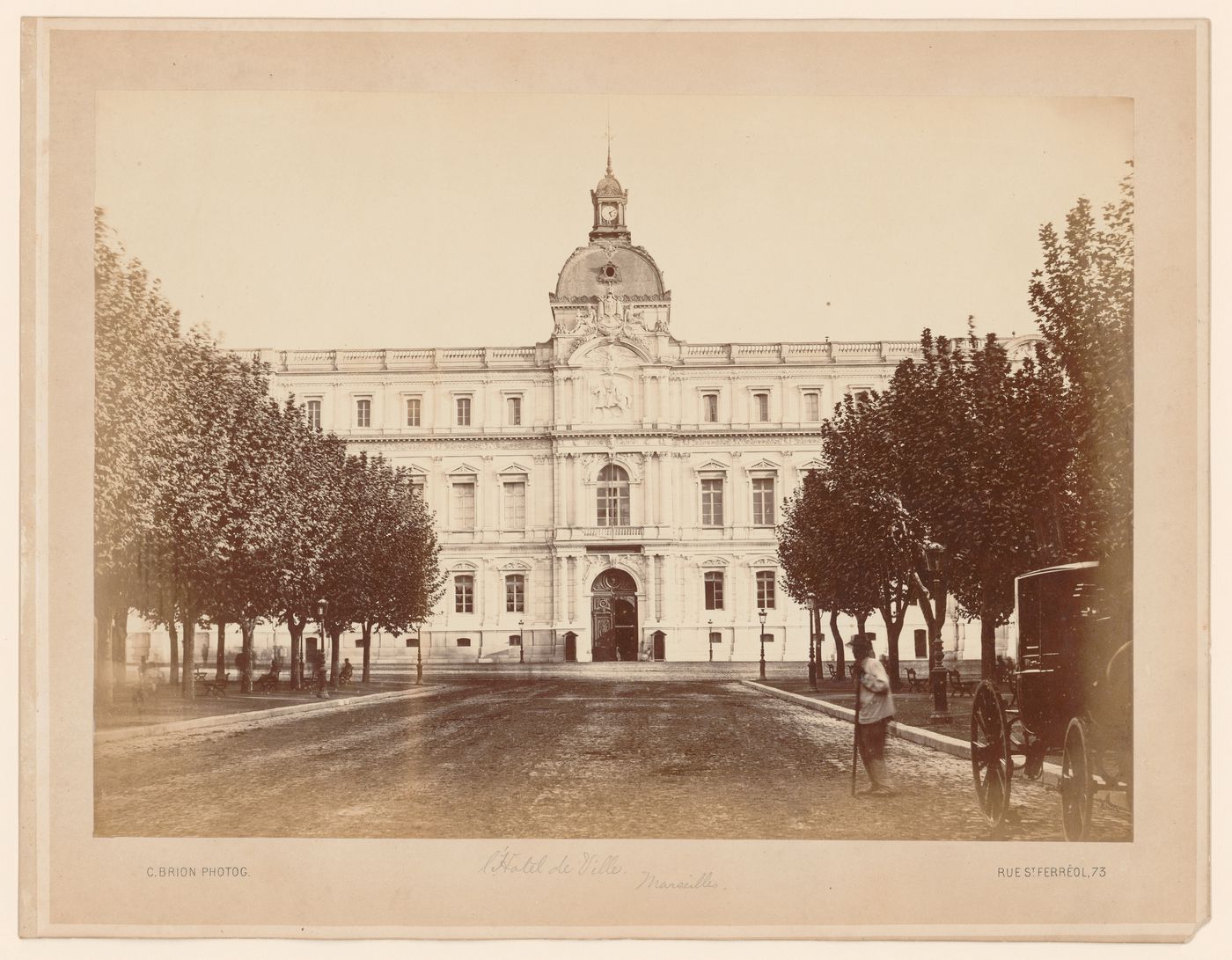 Partial view of façade of the Prefecture, with a tree-lined drive in foreground, Marseille, France