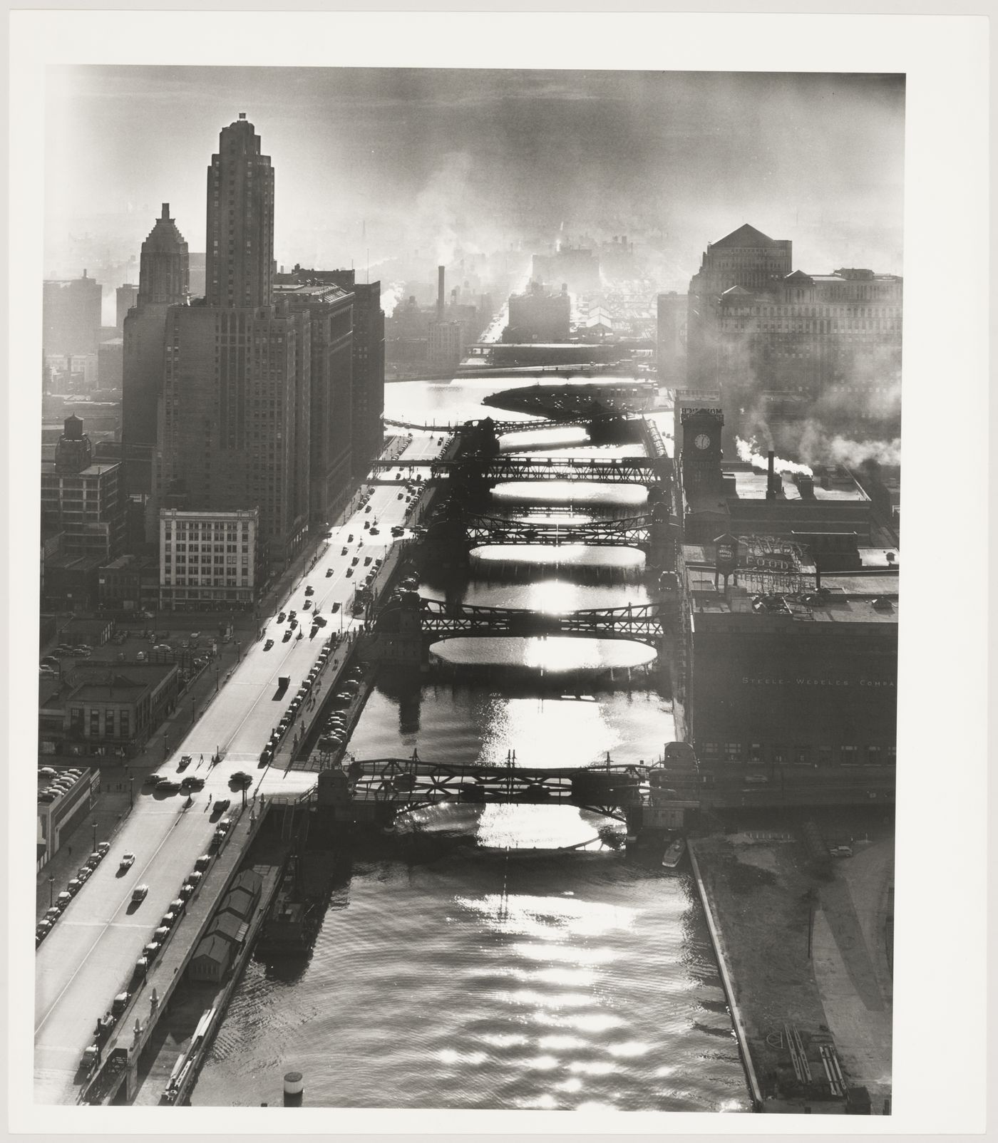 View looking down river, bridges over, buildings on both sides, Chicago, Illinois