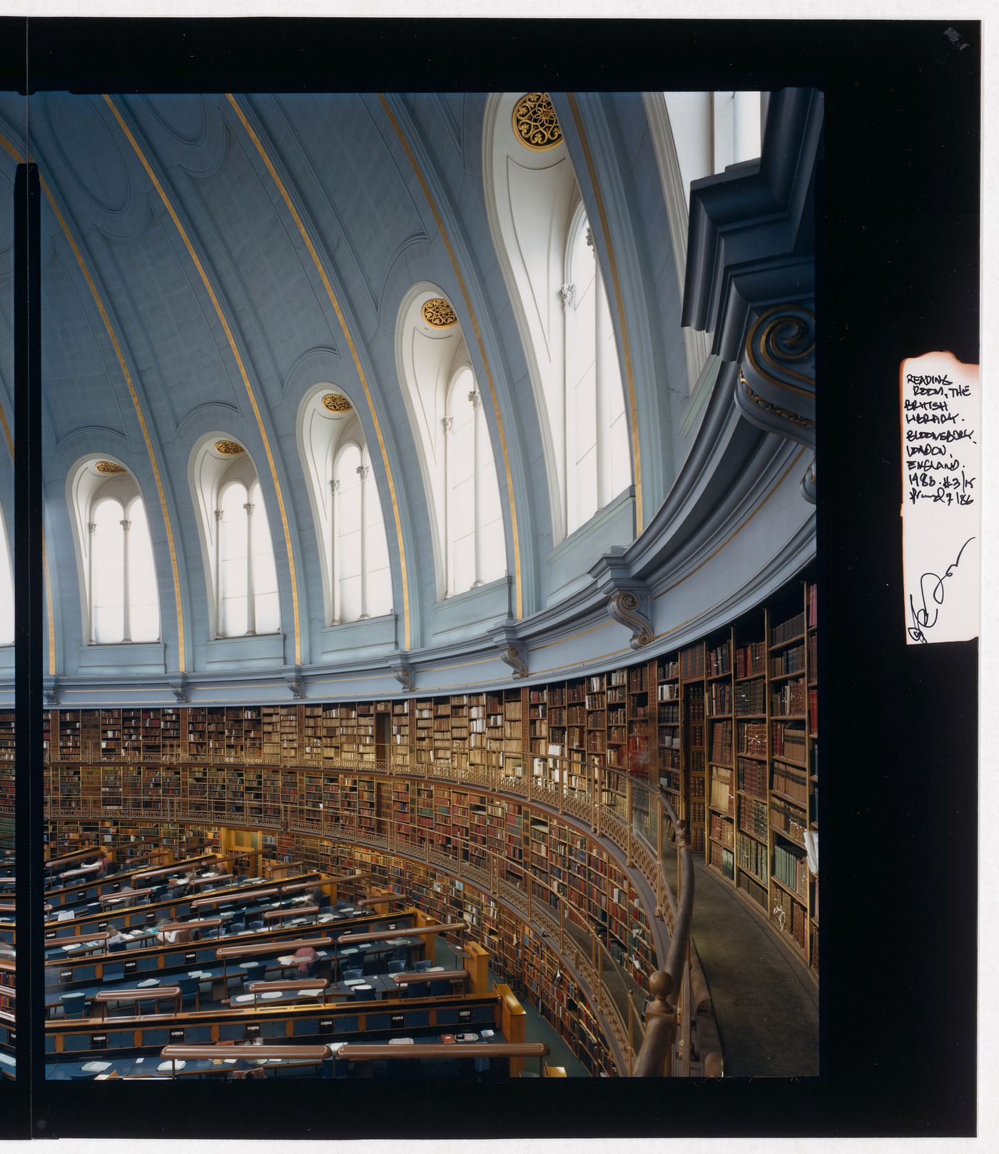 Partial interior view of the Reading Room showing the domed roof, galleries and desks, the British Museum, London, England