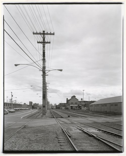 View looking west from Grain Elevator No. 3 [?] (now Phenix Flour Ltd.) showing sheds, railway tracks and power lines, Montréal, Québec