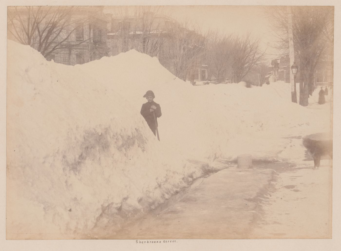 View of rue Sherbrooke after a heavy snowfall, Montréal, Québec