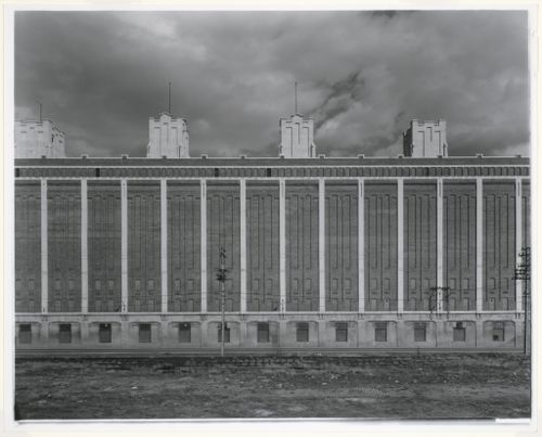 Partial view of the north façade of the Cold Storage Warehouse with railway tracks in the foreground, Port of Montréal, Québec
