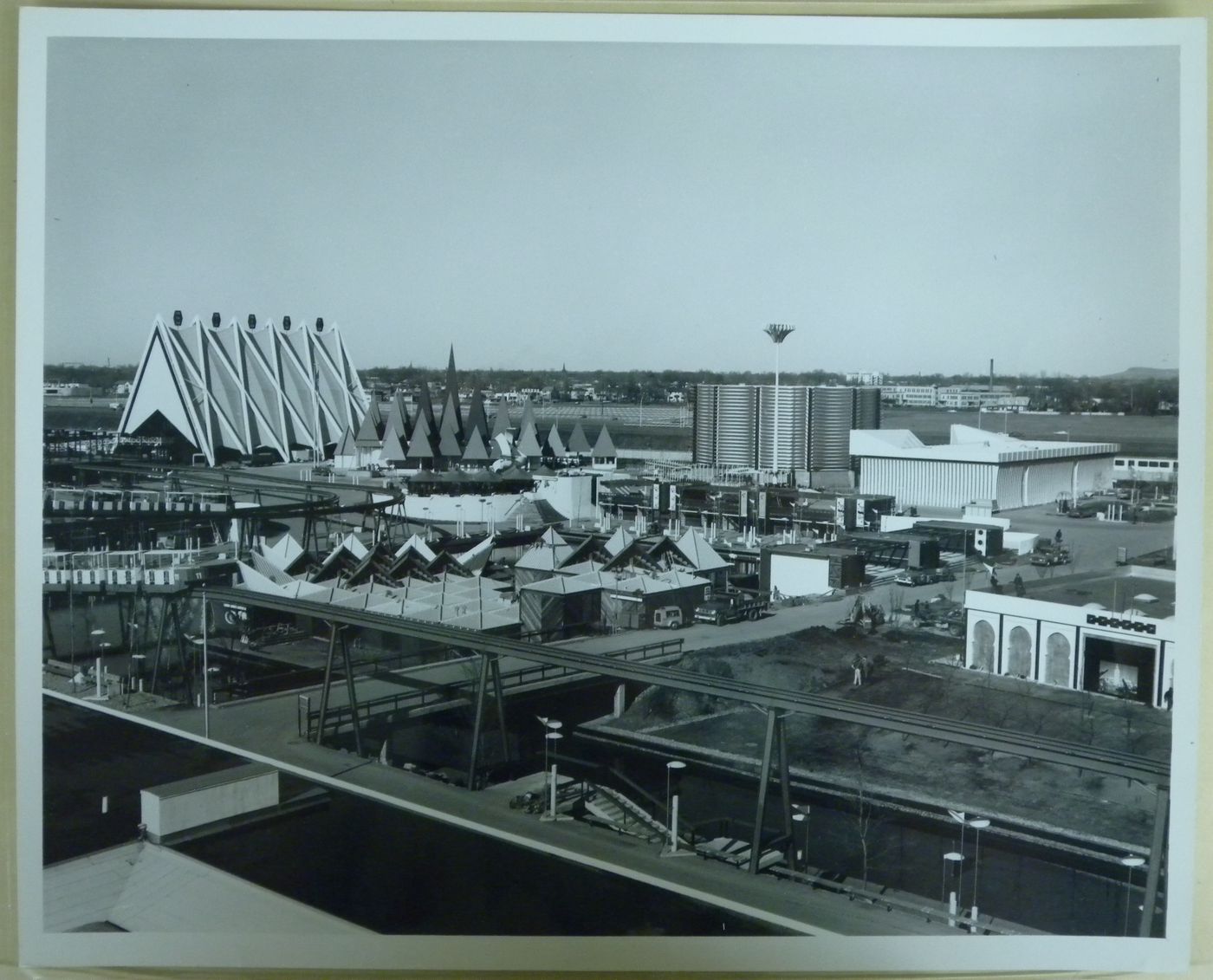 View of the Steel, Canadian Pulp and Paper and Canadian Pacific-Cominco with the minirail in foreground, Expo 67, Montréal, Québec