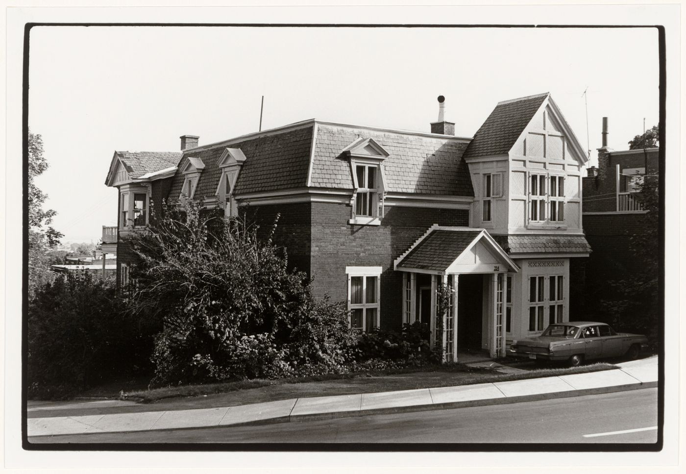 View of the principal and lateral façades of a house, 354 chemin de la
