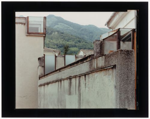 View of exterior walls and windows of the Museo canoviano with mountains in the background, Possagno, Italy