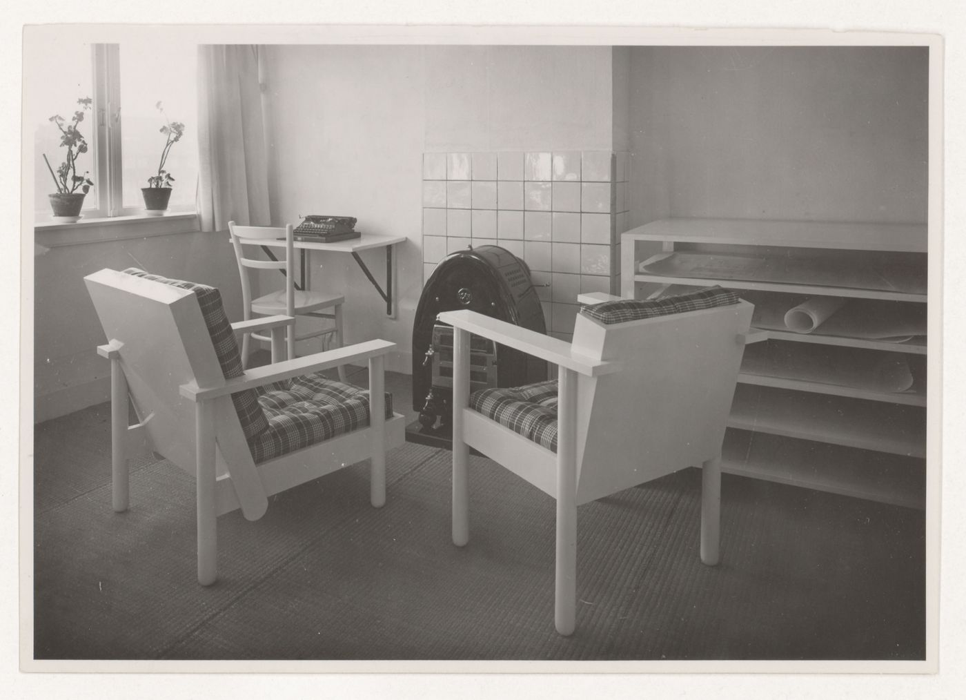 Interior view of J.J.P. Oud's workroom showing the armchairs designed by the architect and shelving for architectural  drawings, Hillegersberg, Rotterdam, Netherlands
