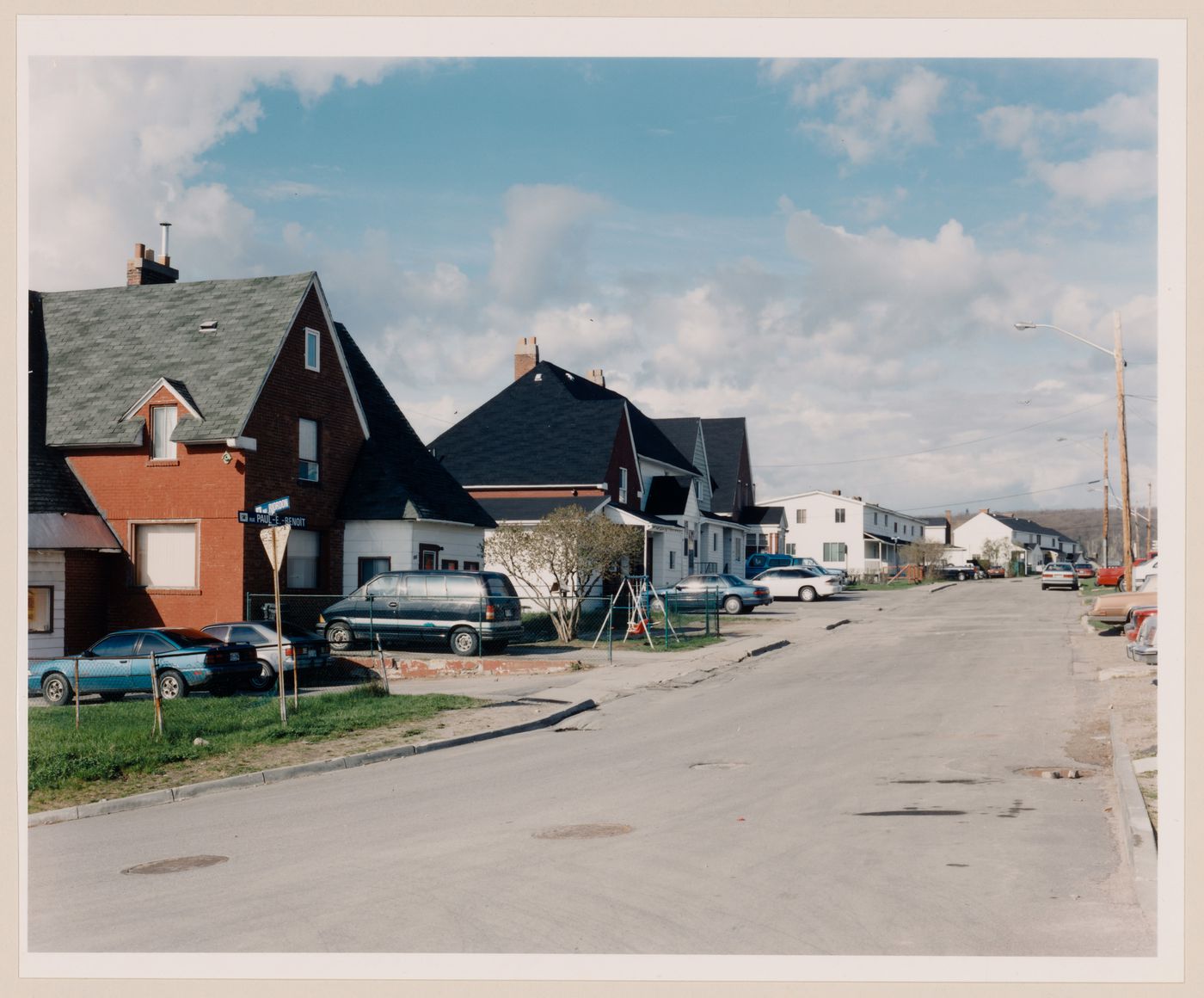 Section 2 of 2 of Panorama of workers' row housing on the corner of rue Paul E. Benoit and avenue Riordon looking south, Témiscaming, Quebec