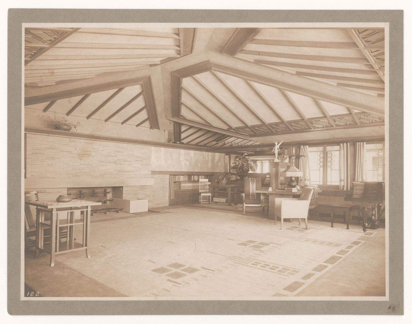 Interior view of Coonley House showing the living room with a statue of an angel in the background, Riverside, Illinois