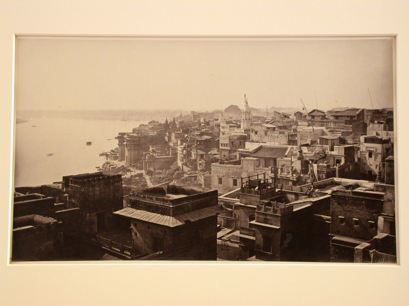 Aerial view of buildings, temples, ghats, and the Ganges River, Benares (now Varanasi), India