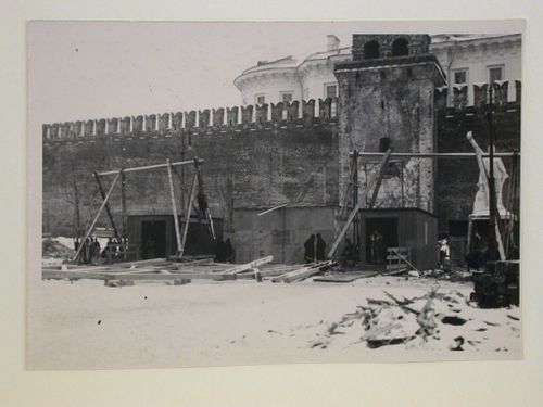 View of the construction site of the first wooden Lenin Mausoleum showing the access wings of the mausoleum and the Kremlin Wall in the background, Red Square, Moscow