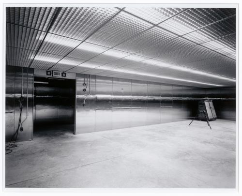 Interior view of the Photographs Collection storage vault on level 2 showing the aluminum walls and suspended ceiling, Canadian Centre for Architecture under construction, Montréal, Québec