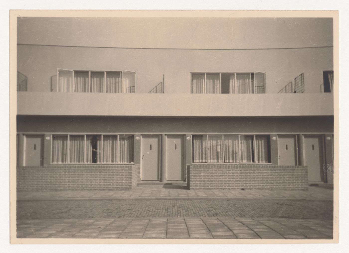 View of the entrances to five industrial row houses, Hoek van Holland, Netherlands