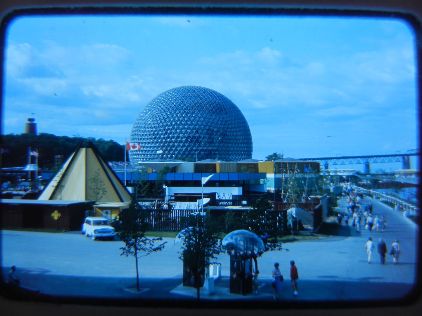 View of the International Scout Centre with the Pavilion of the United States in background, Expo 67, Montréal, Québec