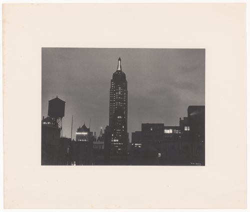 View of shop signs and the Chrysler Building, New York City, New York, United States