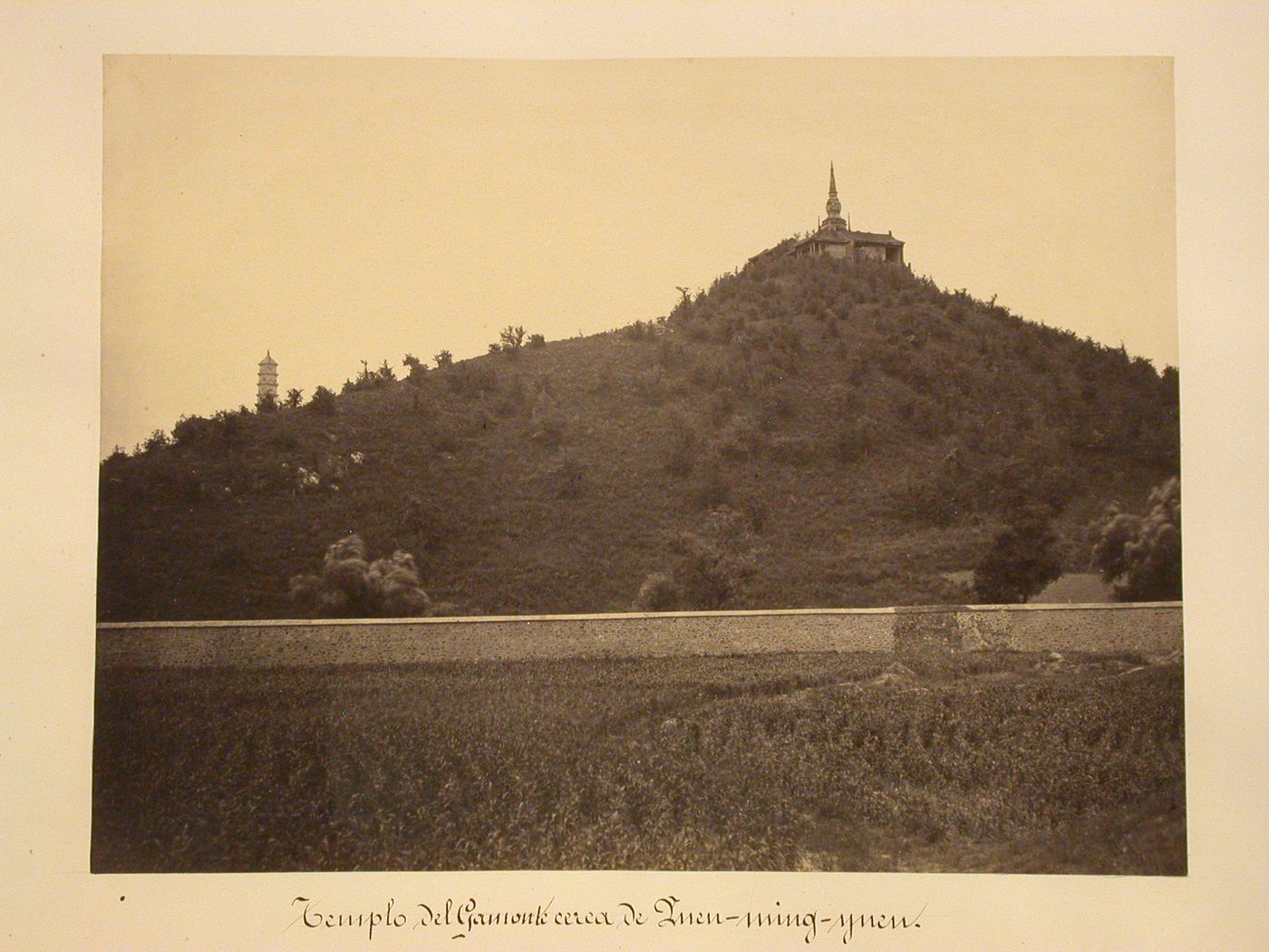 View of a lamaist pagoda with the Jade Peak Pagoda [Yufeng Ta] [?] in the left background, near Peking (now Beijing), China