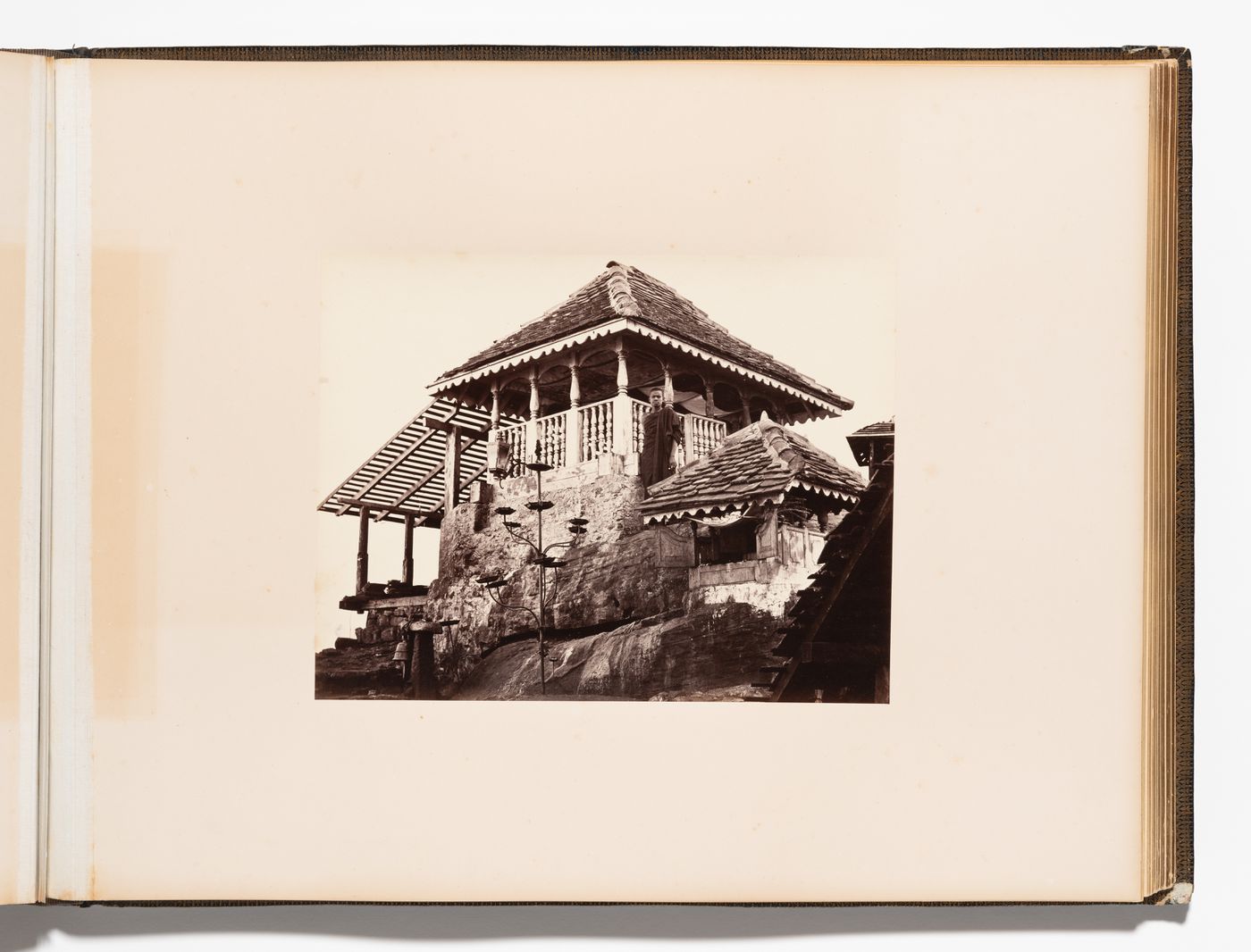 View of shrines [?] and a man, Adam's Peak, Ceylon (now Sri Lanka)