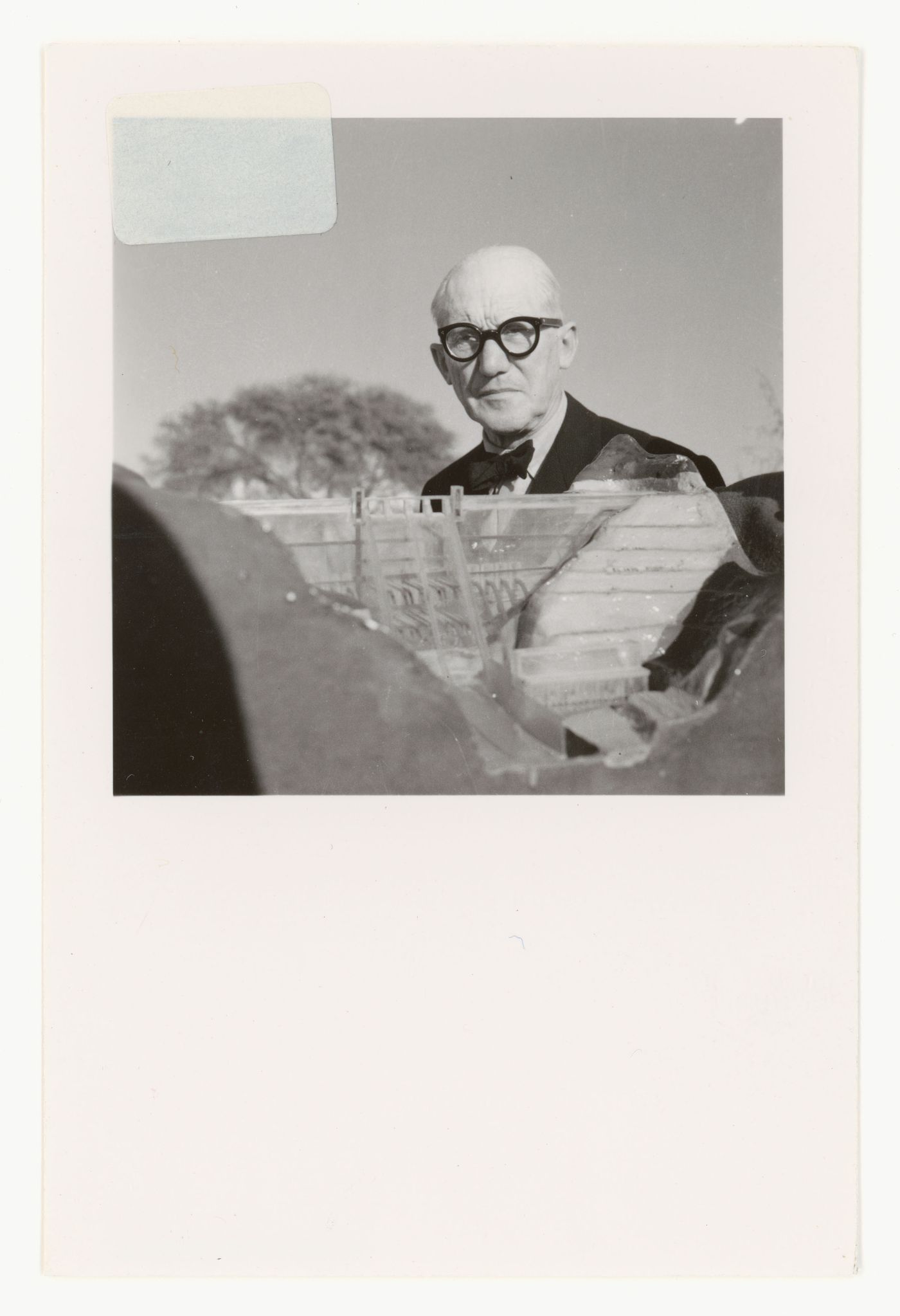 Portrait of Le Corbusier with the Bhakra Dam's model