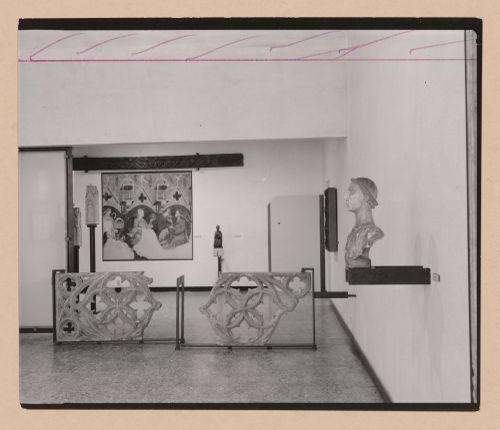 Interior view of a gallery showing a bust, painting and fragments of stone tracery, Museo Correr, Venice, Italy