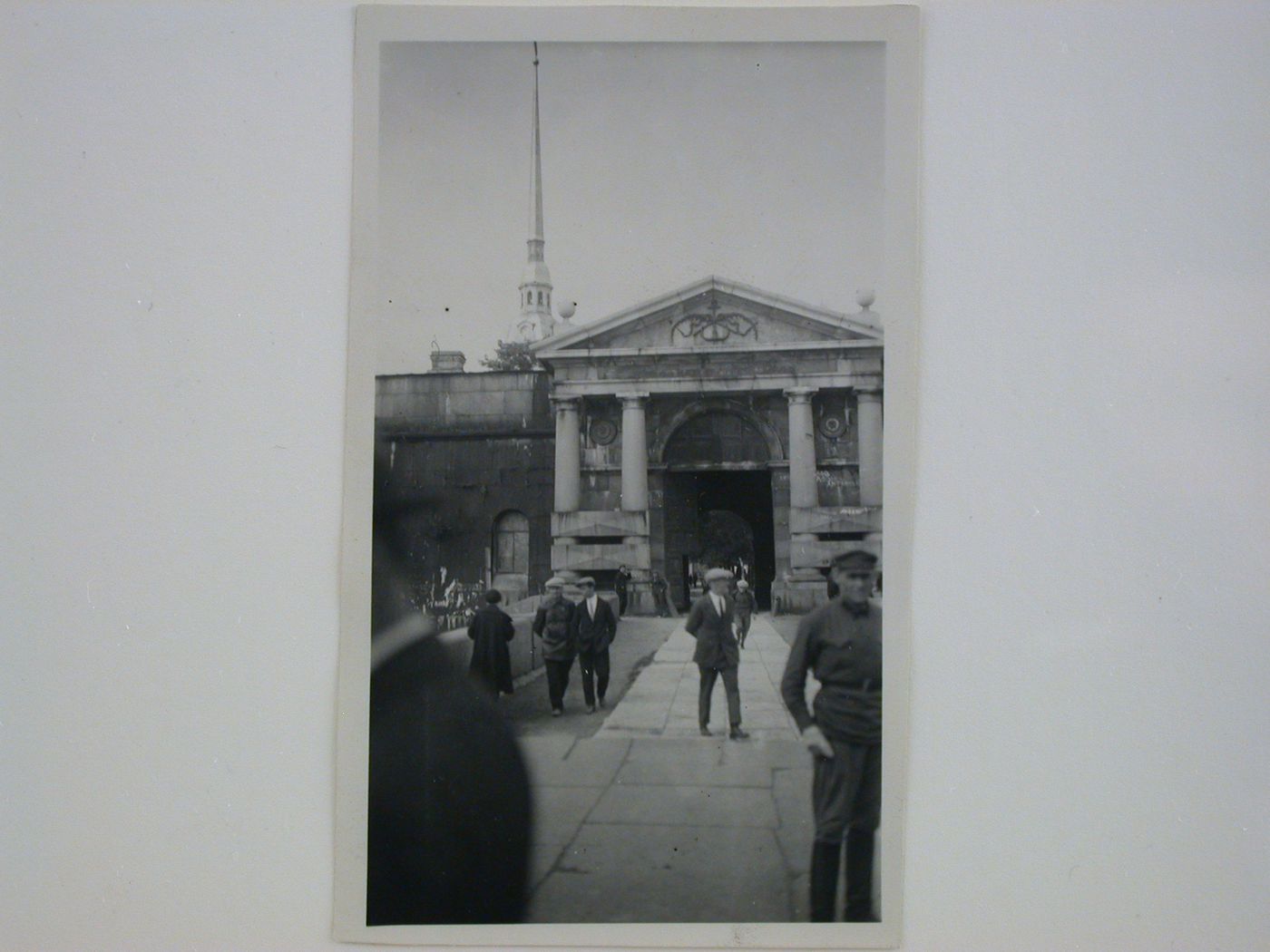 View of a park [?] entrance showing the Admiralty in the background, Leningrad (now Saint Petersburg)