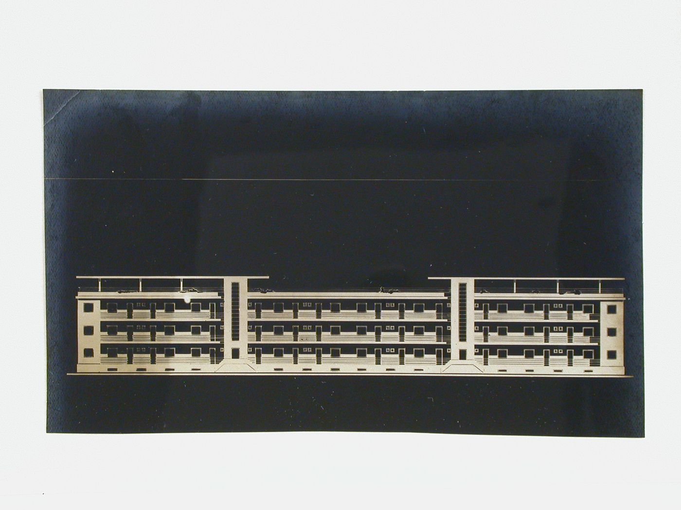 Photograph of a rear elevation for housing for the workers of the Yerevan hydro-electric power station (ErGES), Karmir Banaki Street, Yerevan, Soviet Union (now in Armenia)