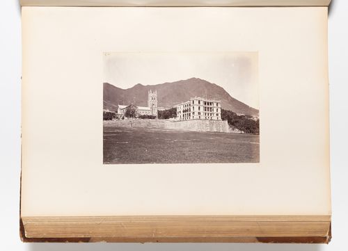 View of St. John's Cathedral and the premises of Augustine Heard & Co. showing the Parade Ground (also known as the Murray Parade Ground) in the foreground, Hong Kong (now Hong Kong, China)