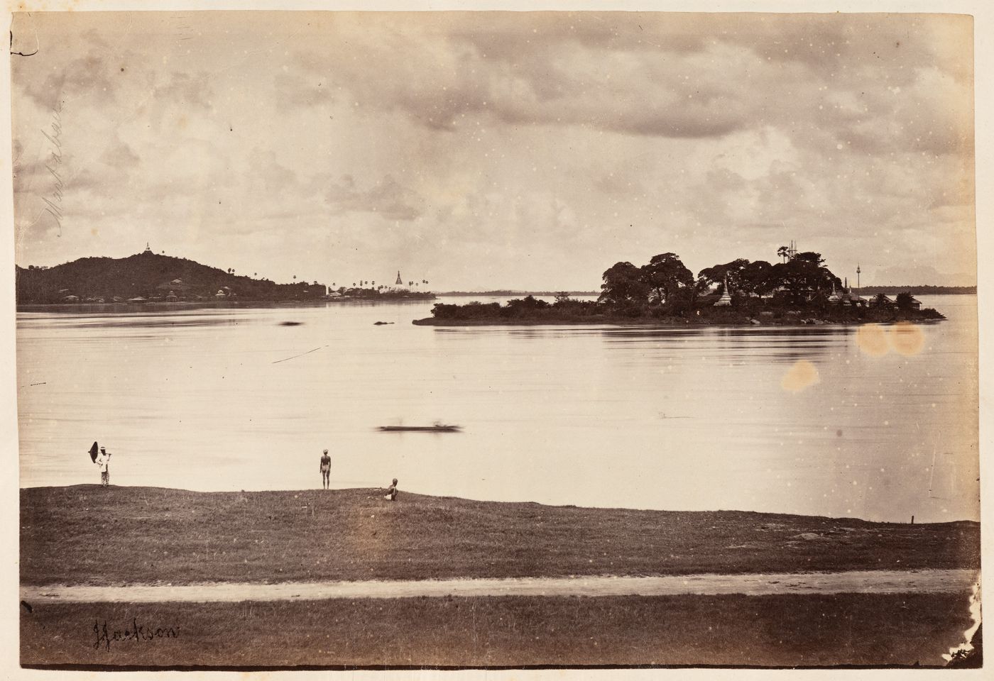 View of a river and an island with stupas showing additional stupas in the background, Martaban, Burma (now Myanmar)