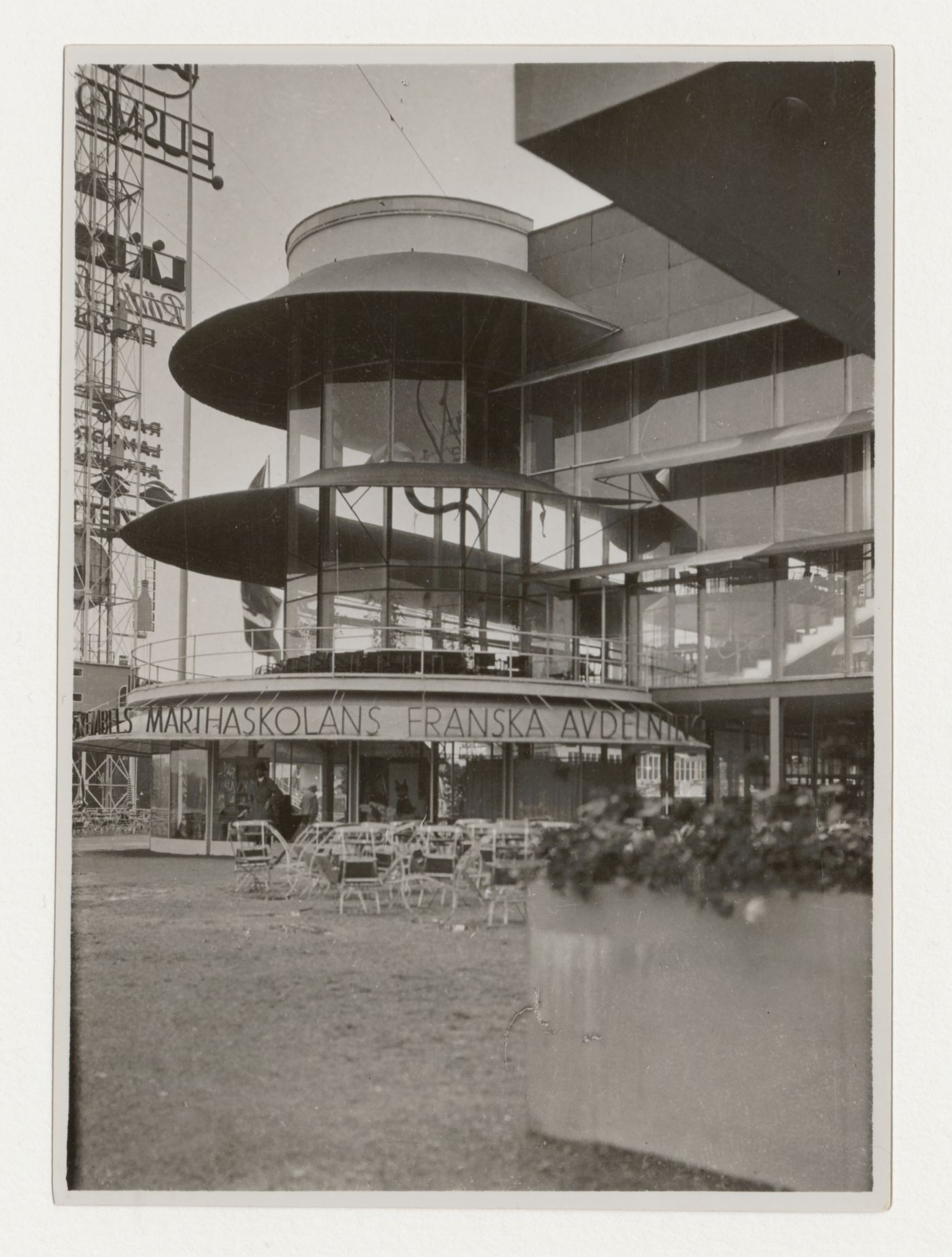 View of the lateral façade of Paradise Restaurant at the Stockholm Exhibition of 1930 with the advertising mast in the background, Stockholm