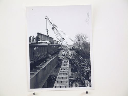 View of inner girder being picked up by crane from rail wagon, Bushey Bridge, England