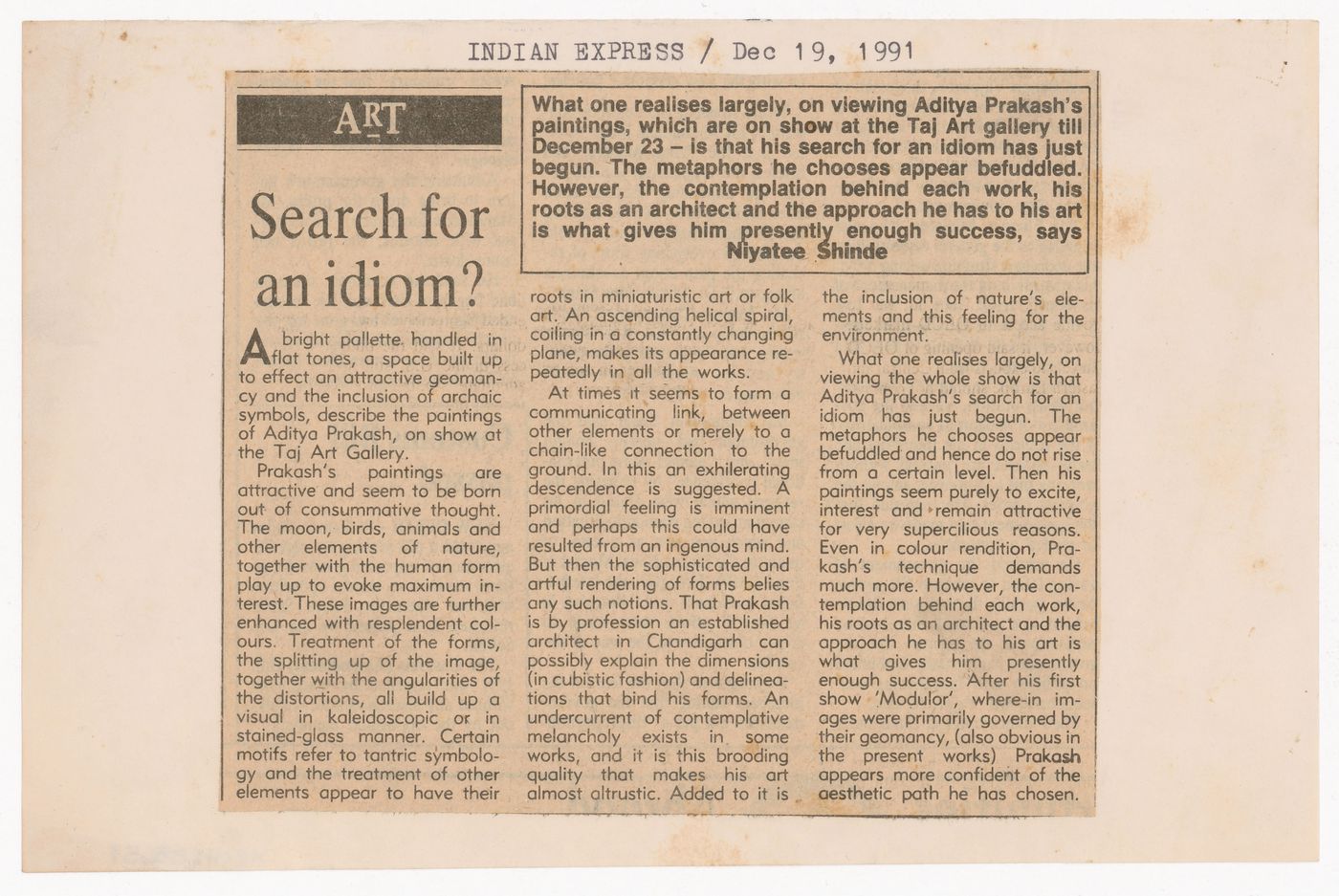 Newspaper article titled "Search for an Idiom?" on Aditya Prakash's artwork in the Indian Express