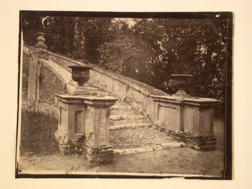 Base of exterior stairway with urns, Italy